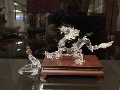 Lot 1327 - Swarovski crystal Dragon (ball missing), together with juggling Seal, both boxed