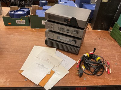 Lot 2237 - Quad Audio equipment comprising Quad 67 CD player, FM4 Tuner, 34 Pre AMP, 306 Power Amp, in a Quad Hifi rack, together with cables and associated paperwork.