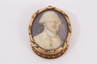 Lot 516 - 18th century oval portrait miniature on ivory of a gentleman, in two-colour gold mount with clasp fittings and continental hallmarks, 42mm x 31mm. APHA Ref: XXPKXCM4