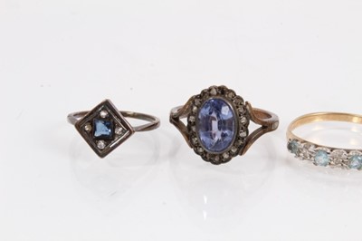 Lot 1058 - Four vintage 9ct gold gem set dress rings