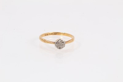 Lot 1000 - 18ct gold diamond cluster ring in platinum illusion setting