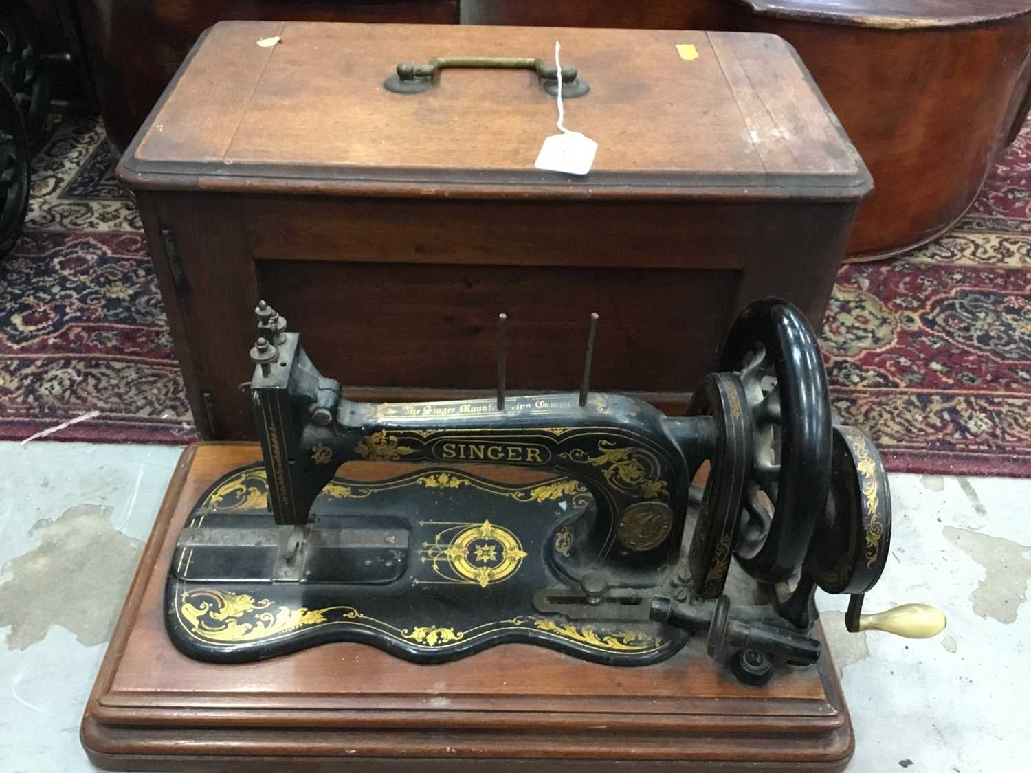 Lot 2605 - Vintage Singer sewing machine with cover