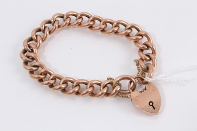 Lot 1002 - Edwardian 9ct rose gold curb link bracelet with padlock clasp