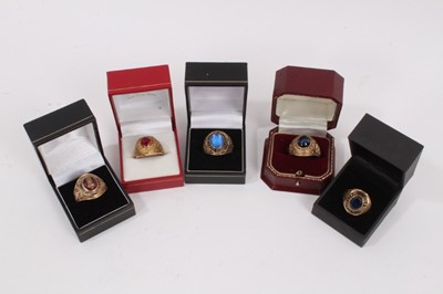Lot 1019 - Five gold gem set college/ university rings