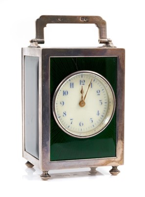 Lot 651 - Late Victorian silver and green guilloché enamel carriage clock (London 1897).