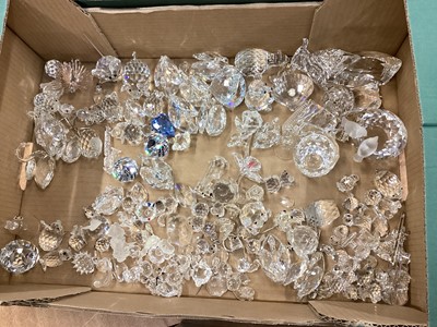 Lot 1345 - Large selection of unboxed Swarovski crystal including Lion, Bull, Dogs, Cats, Hedgehogs, Owls, and other items (qty)