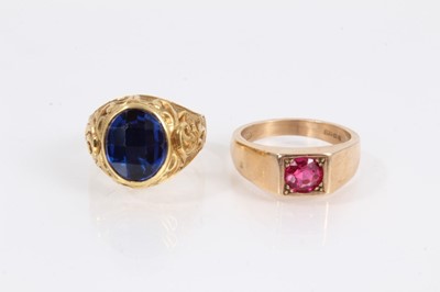 Lot 1024 - 14ct gold synthetic pink stone ring and Continental gold faceted oval blue stone ring (2)