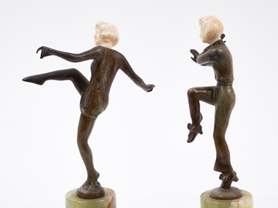 Lot 710 - Pair of Art Deco patinated bronze and carved ivory figures of female dancers