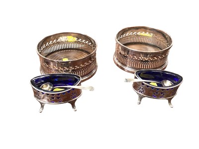 Lot 25 - Pair of Regency Old Sheffield Plate chamber sticks with snuffers, pair of antique silver plated decanter coasters, pair of Georgian silver plated salts with blue glass liners and a pair of Georgian...