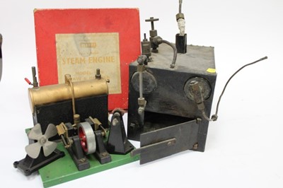 Lot 1828 - A Merit stationery steam engine, a vertical steam model and related items.