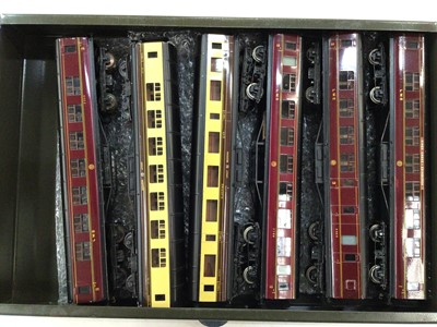 Lot 1866 - Railway OO gauge selection of Exley tinplate carriages housed in metal cabinet various lines including Great Western, L.M.S., and others (28)