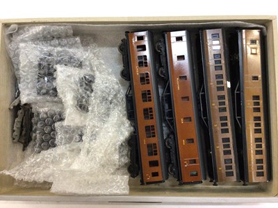 Lot 1865 - Railway OO gauge selection of Exley tinplate carriages housed in grey cabinet various lines in L.M.S., LNER, GW, and others