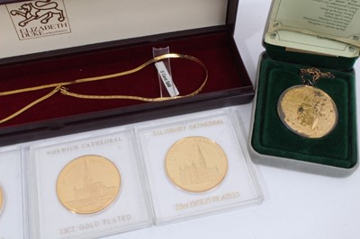 Lot 1035 - 9ct gold cased wristwatch, 9ct gold chain, coin necklace and three gold plated souvenir coins