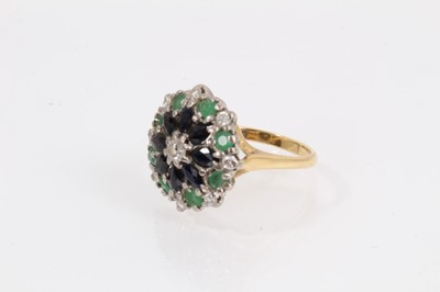 Lot 1050 - 1980s 18ct gold diamond, sapphire and emerald cluster ring