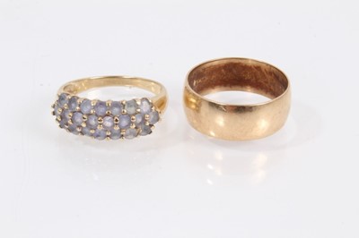 Lot 1053 - 9ct gold wedding ring and one other 9ct gold three row gem set ring (2)