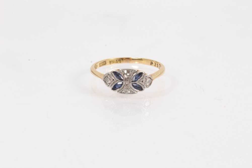 Lot 1062 - 1920s diamond and sapphire ring with four marquis cut blue sapphires and four single cut diamonds