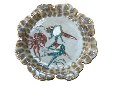 Lot 75 - Unusual Japanese celadon glazed pottery plate depicting Toads and an Octopus.