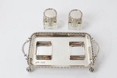 Lot 201 - Victorian Georgian-style silver inkstand with twin silver mounted glass bottles