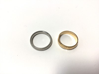 Lot 25 - Palladium wedding ring and a yellow metal wedding ring