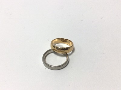 Lot 25 - Palladium wedding ring and a yellow metal wedding ring