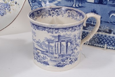 Lot 28 - Group of 19th century  English ceramics, including a blue and white platter, footed dish, two-division mug, and two moulded dishes, together polychrome dish painted with floral sprays (6)