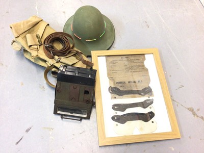 Lot 685 - Second World War Tank periscope, canvas webbing items, anti gas eye shields and a tin helmet.