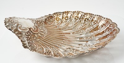 Lot 207 - Edwardian silver shell-shaped dish with pierced and floral embossed decoration