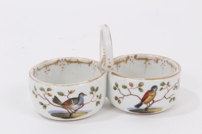 Lot 65 - A Meissen double salt with loop handle, polychrome decorated with birds, 9.5cm wide