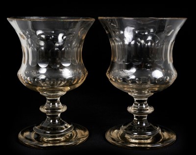 Lot 77 - A large pair of 19th century glass goblets, with facet cut bowls and knopped stems, 24cm high, together with a pair of 19th century cut glass sweetemeat dishes and covers, 18cm high (4)