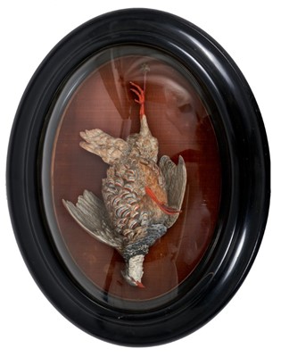 Lot 936 - 19th century French bisque trophy figure of a French partridge in oval domed case