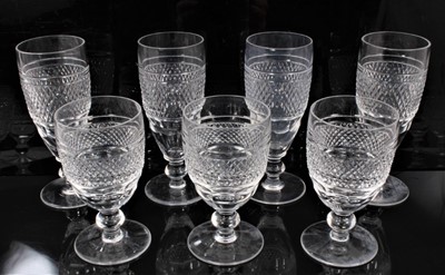 Lot 81 - Service of 21 Waterford Cashel pattern wine glasses, including twelve white wine glasses measuring 12cm high, and nine champagne flutes measuring 12.25cm high