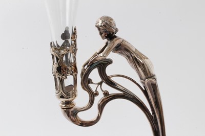 Lot 214 - Late 19th century Art Nouveau WMF silver plated table centre with cut glass trumpet vase and cut glass bowl below, female figure mount and shamrock decoration 49cm high
