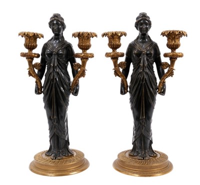 Lot 736 - Pair of early 19th century French bronze candlesticks