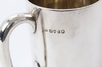 Lot 218 - Victorian silver tankard of plain tapered form with loop handle, (London 1874), 11.5 cm high approx 8.5 ozs
