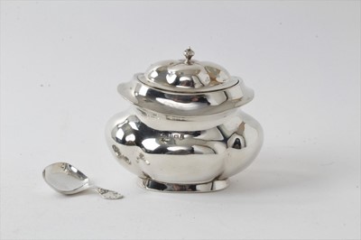 Lot 220 - Edwardian silver tea caddy of lobed form with hinged cover and silver caddy spoon