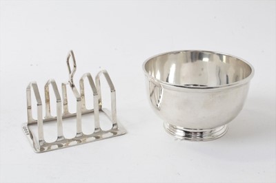 Lot 221 - Plain silver sugar bowl raised on circular foot, (London 1930), approx 5.5ozs and silver toast rack, (Sheffield 1930) (2)