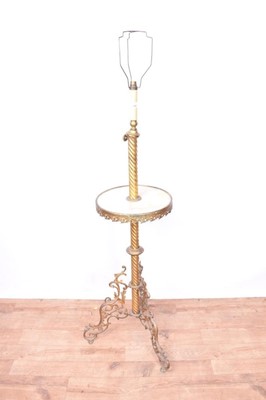 Lot 1283 - Early 20th century gilt metal and alabaster standard lamp, with spiral twist column and circular platform, raised on scrolling tripod supports