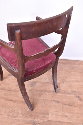 Lot 1308 - Set of ten George IV mahogany bar back dining chairs, each with slip in seat on square tapered legs, two include a pair of carvers