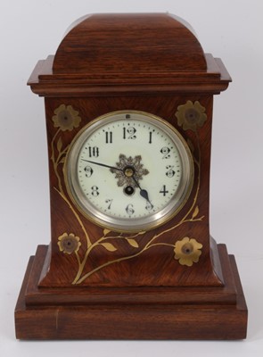 Lot 664 - Art Nouveau mantel clock in brass floral inlaid rosewood case