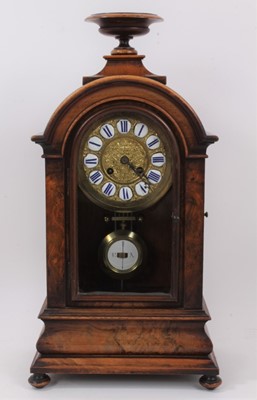 Lot 663 - Victorian walnut clock