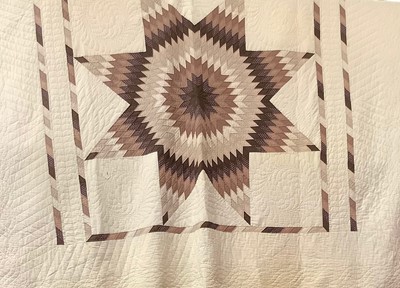 Lot 2083 - Amish quilt, made by the community near Columbus, Ohio, Starburst pattern hand-quilted with machined seams.