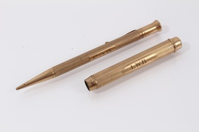Lot 548 - Two 9ct gold cased pencils