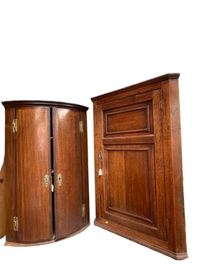 Lot 82 - George III oak corner cupboard and another corner cupboard