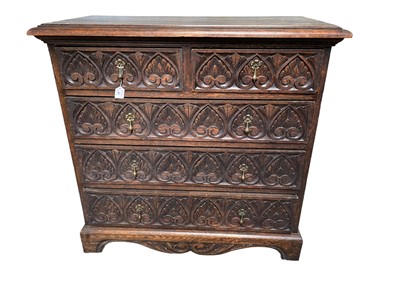 Lot 83 - Early 20th century carved oak chest of drawers