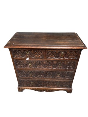 Lot 83 - Early 20th century carved oak chest of drawers
