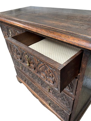 Lot 83 - Early 20th century carved oak chest of drawers