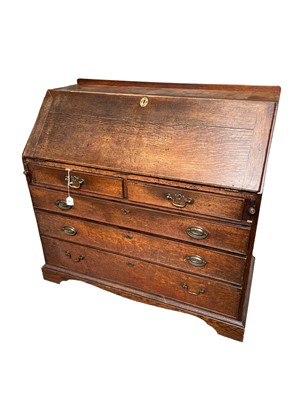 Lot 80 - George III oak bureau