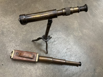 Lot 149 - WWI style leather mounted brass handheld telescope and similar microscope