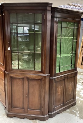 Lot 1426 - Near pair of early  20th century mahogany floorstanding corner cupboards