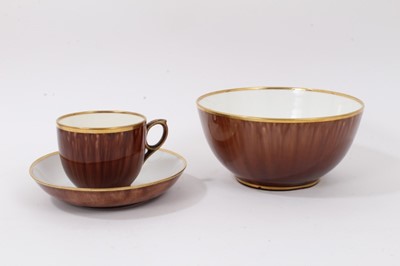 Lot 245 - A Rockingham tortoiseshell glazed teacup, saucer and a bowl, circa 1840